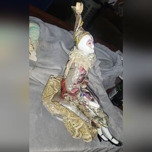 Musical vintage porcelain clown doll